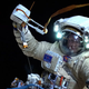 Illustration for article titled Beautiful Images of Astronauts Releasing Nanosatellites Into Space